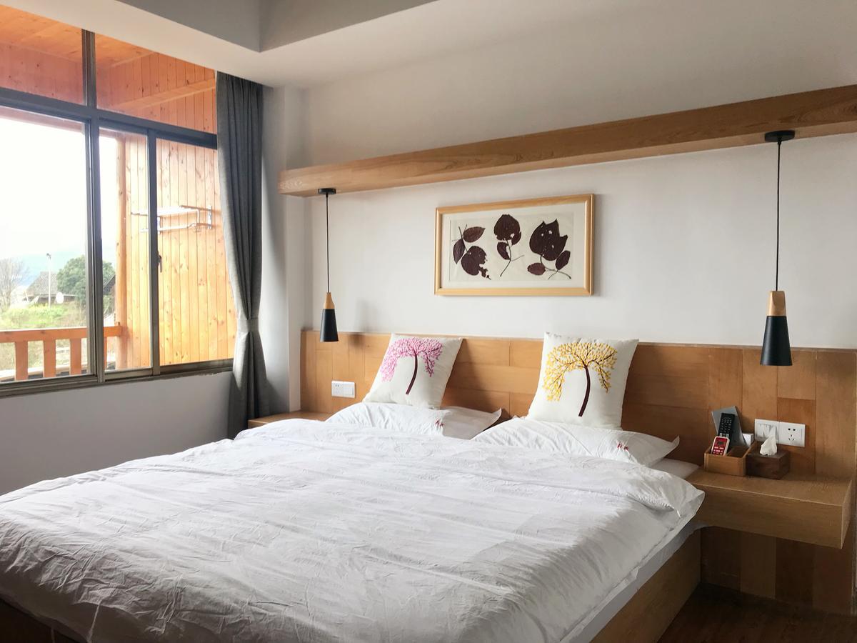Travelling With Hotel Long Ji Ping An 竜勝 エクステリア 写真
