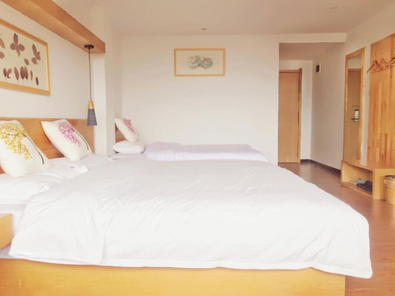 Travelling With Hotel Long Ji Ping An 竜勝 エクステリア 写真