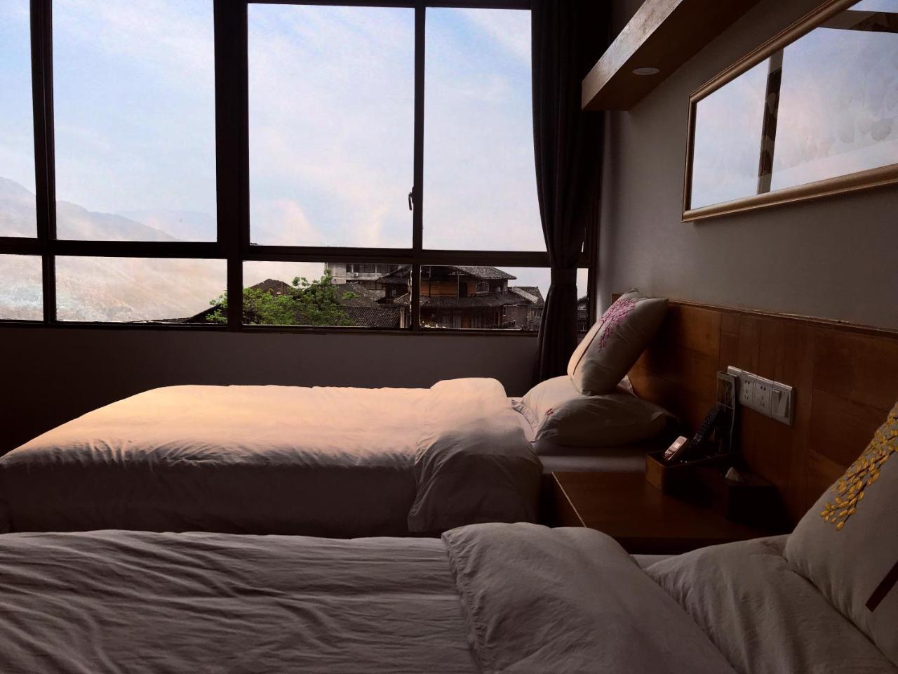 Travelling With Hotel Long Ji Ping An 竜勝 エクステリア 写真
